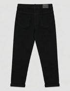 Jean 7/8ème slim noir à 5 boutons seul sur fond neutre, vue de dos - Voggo